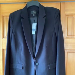 Worthington 14T black suit coat. One button.
